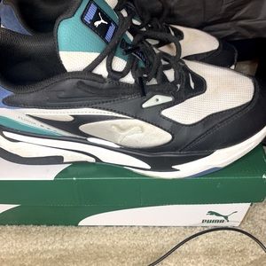 White black and blue pumas